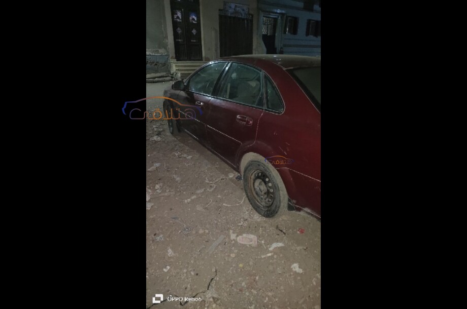 Optra Chevrolet احمر غامق