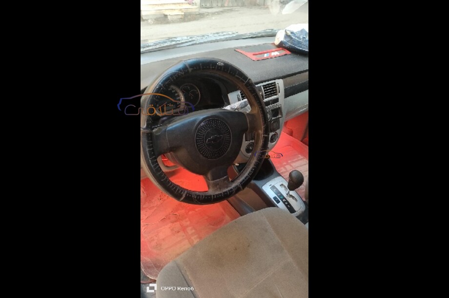 Optra Chevrolet احمر غامق