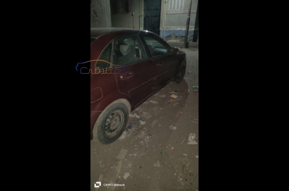 Optra Chevrolet احمر غامق