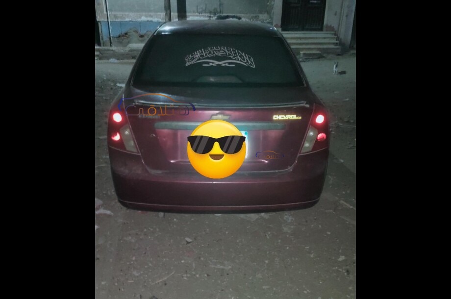 Optra Chevrolet احمر غامق