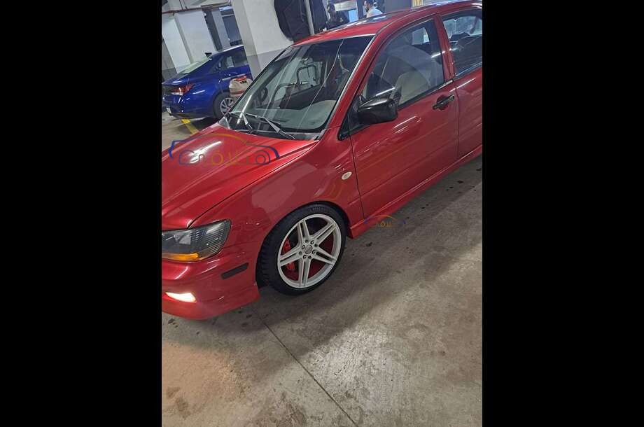 Lancer Mitsubishi احمر