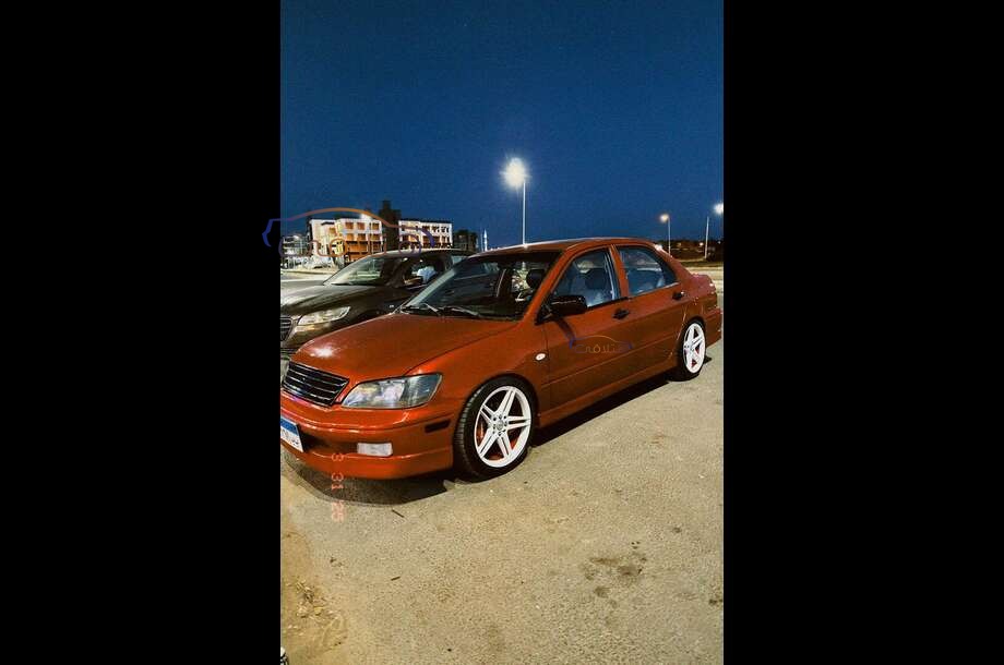 Lancer Mitsubishi احمر