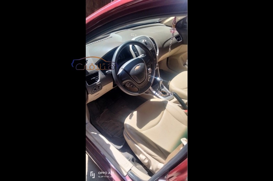 Optra Chevrolet احمر