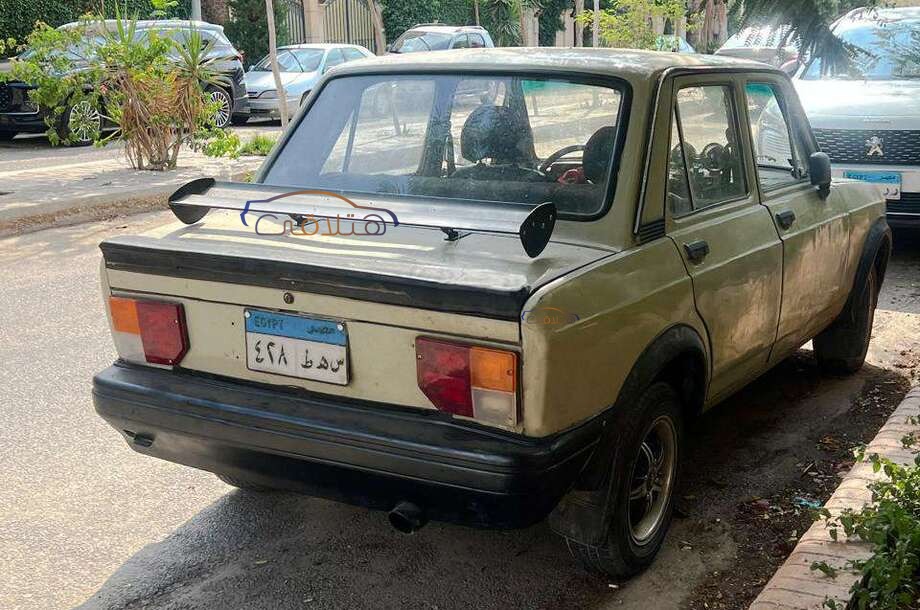 128 Fiat ذهبي