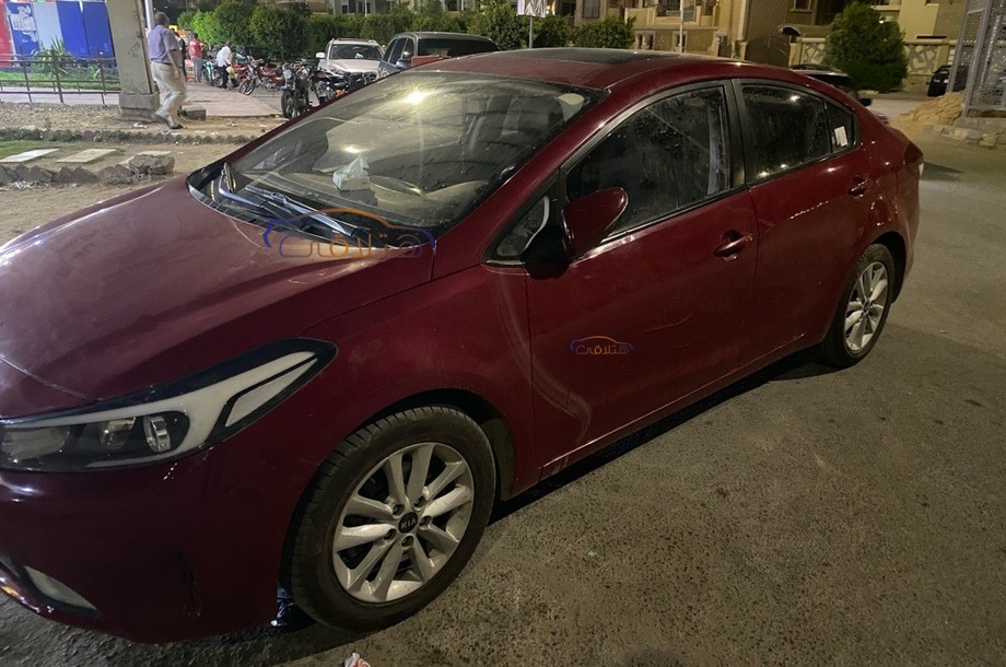 Cerato Kia احمر غامق