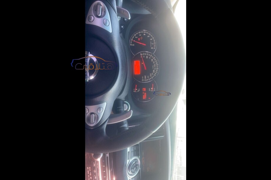 Maxima Nissan احمر غامق