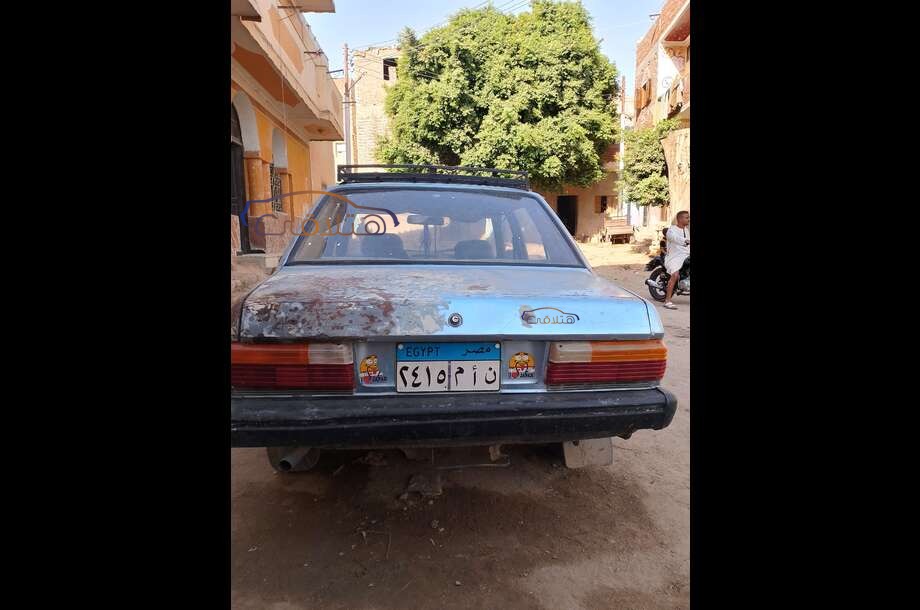 305 Peugeot أزرق