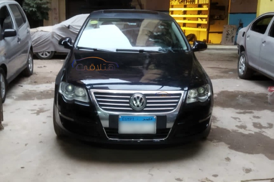 Passat Volkswagen أسود