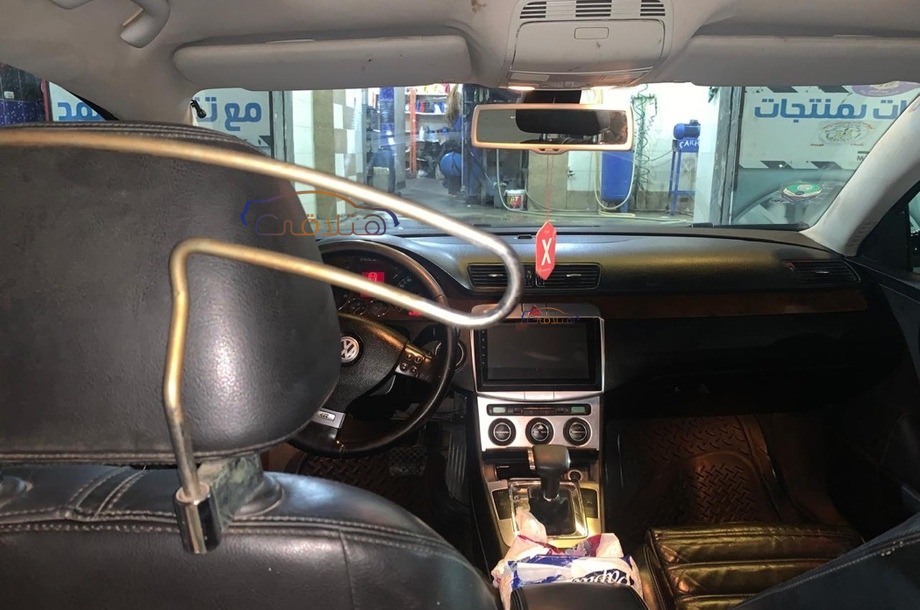 Passat Volkswagen أسود