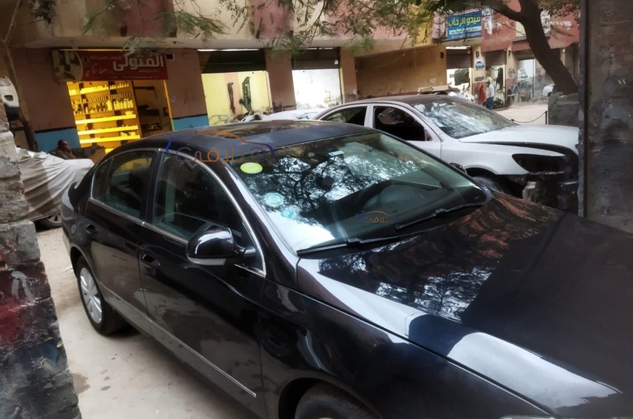 Passat Volkswagen أسود