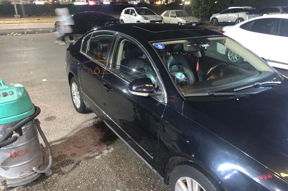 Passat Volkswagen أسود