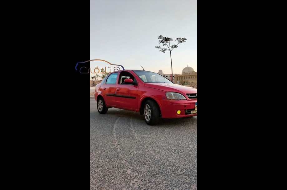 Corsa Opel احمر