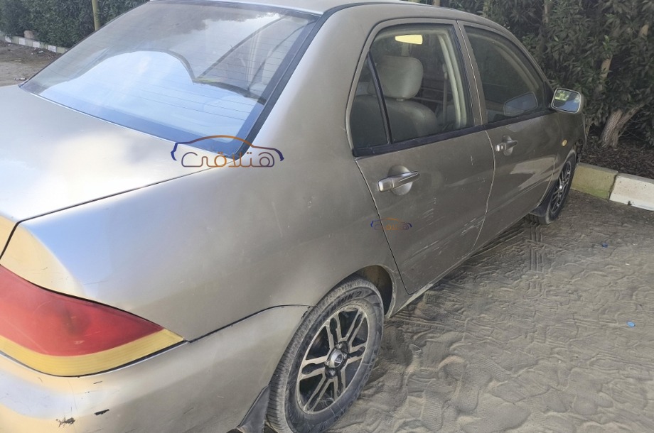 Lancer Puma Mitsubishi شمبان