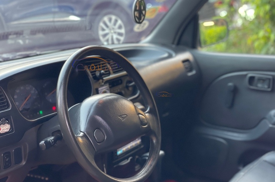 Mira Daihatsu فضي