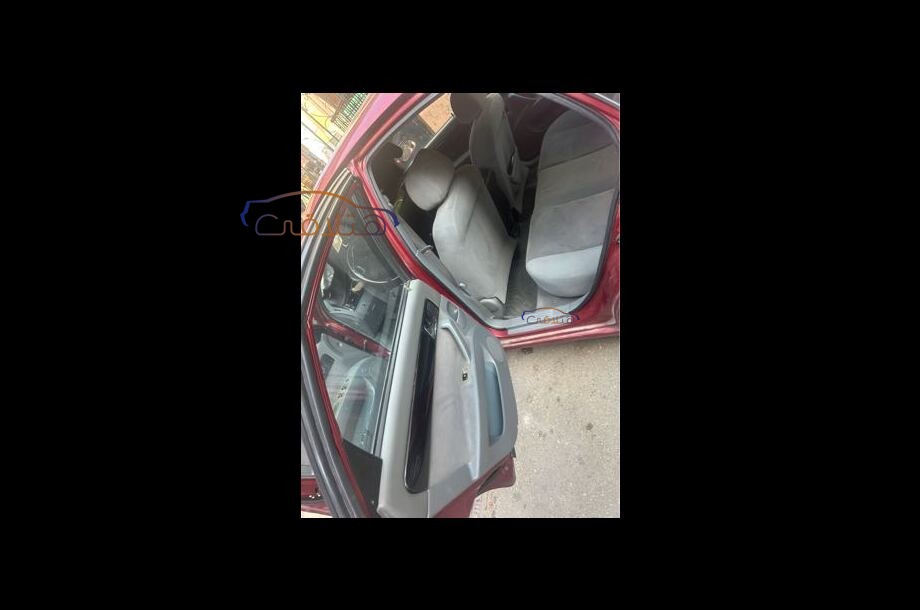 Optra Chevrolet Dark red