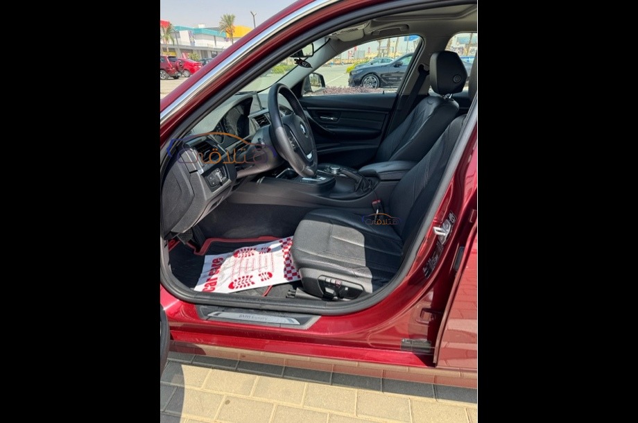 320 BMW Dark red