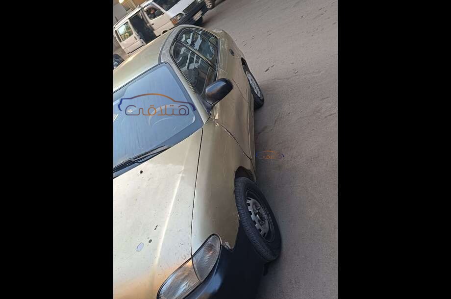 Accent Hyundai ذهبي