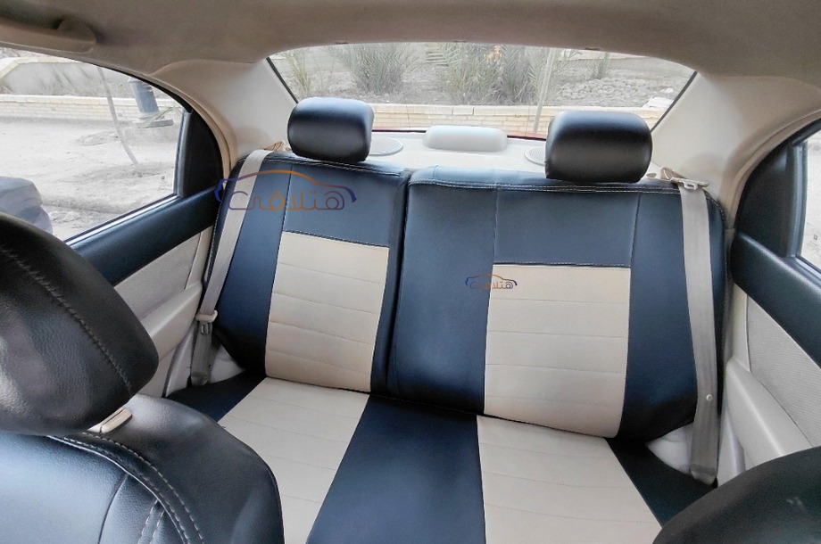 Aveo Chevrolet Dark red