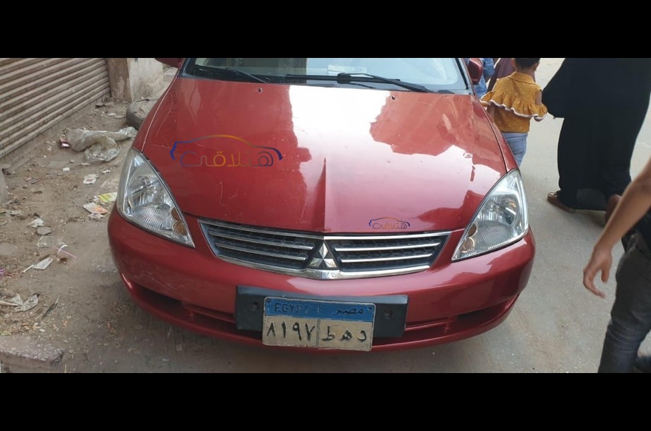 Lancer Puma Mitsubishi احمر