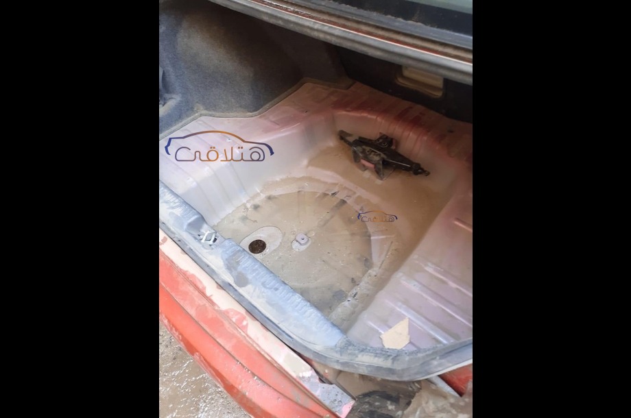 Lancer Puma Mitsubishi احمر