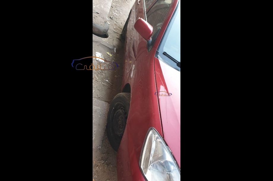 Lancer Puma Mitsubishi احمر