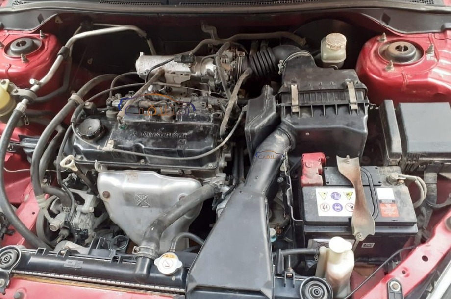 Lancer Puma Mitsubishi احمر