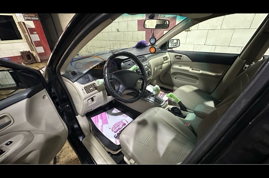 Lancer Puma Mitsubishi أسود