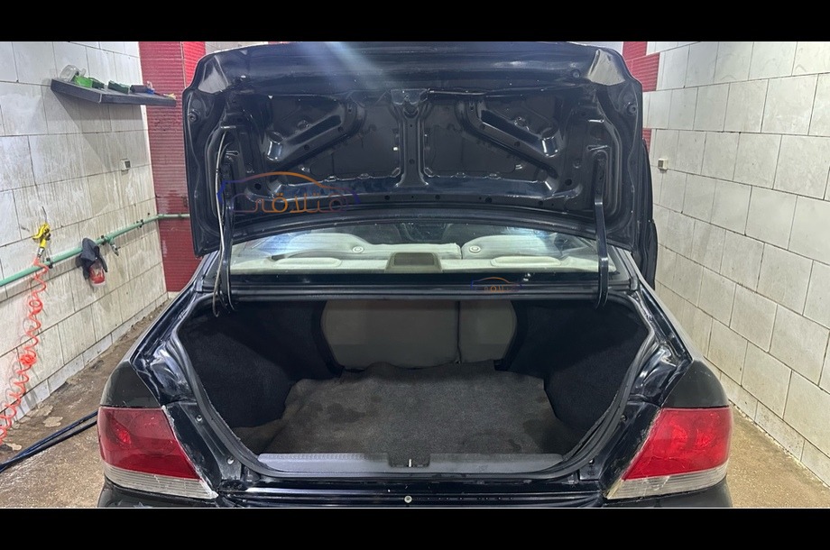 Lancer Puma Mitsubishi أسود