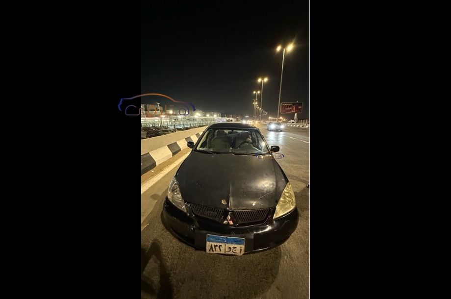 Lancer Puma Mitsubishi أسود