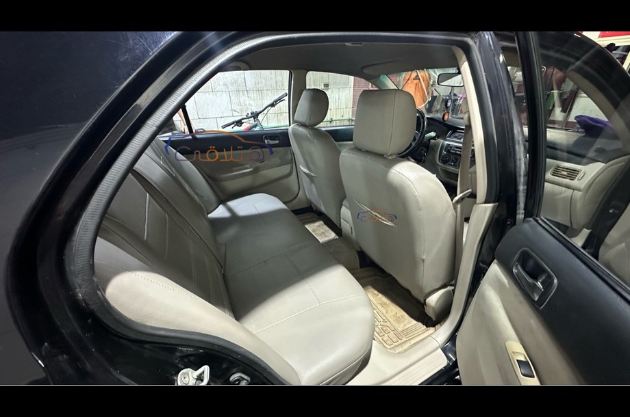 Lancer Puma Mitsubishi أسود