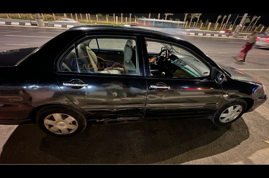 Lancer Puma Mitsubishi أسود