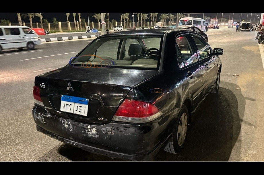 Lancer Puma Mitsubishi أسود