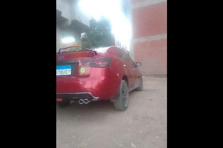 Cerato Kia احمر غامق