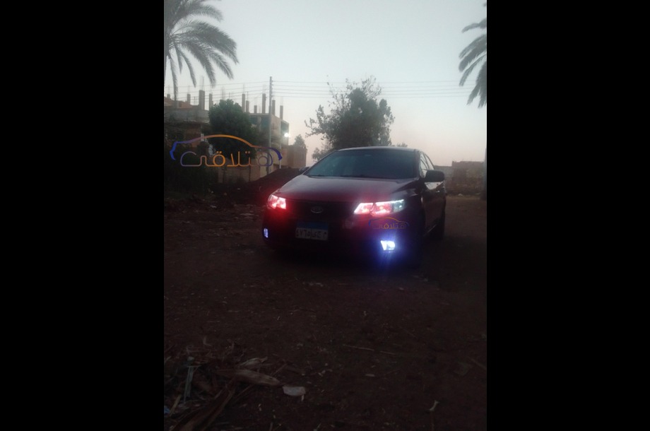 Cerato Kia احمر غامق