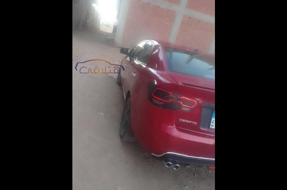 Cerato Kia احمر غامق