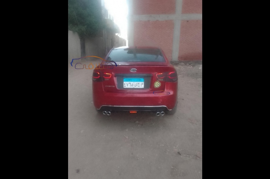 Cerato Kia احمر غامق