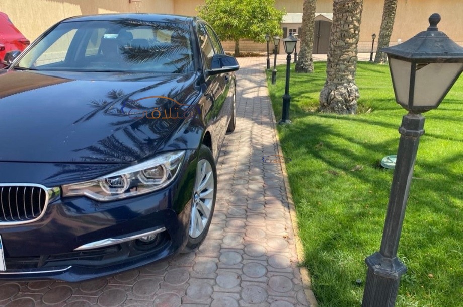 318 BMW أزرق