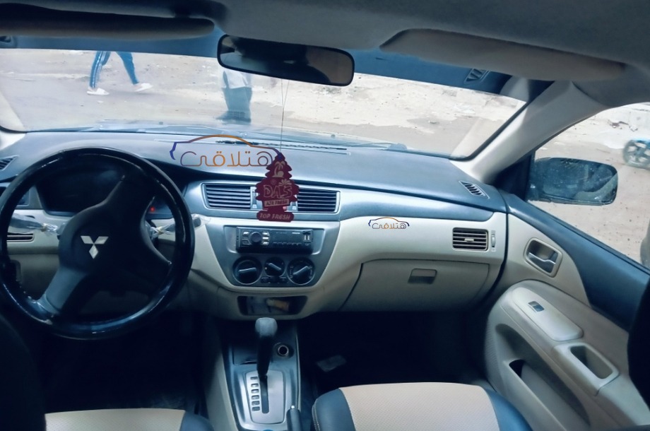 Lancer Puma Mitsubishi أسود