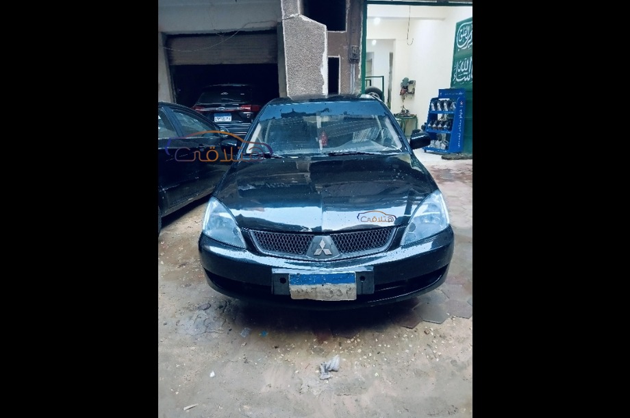 Lancer Puma Mitsubishi أسود