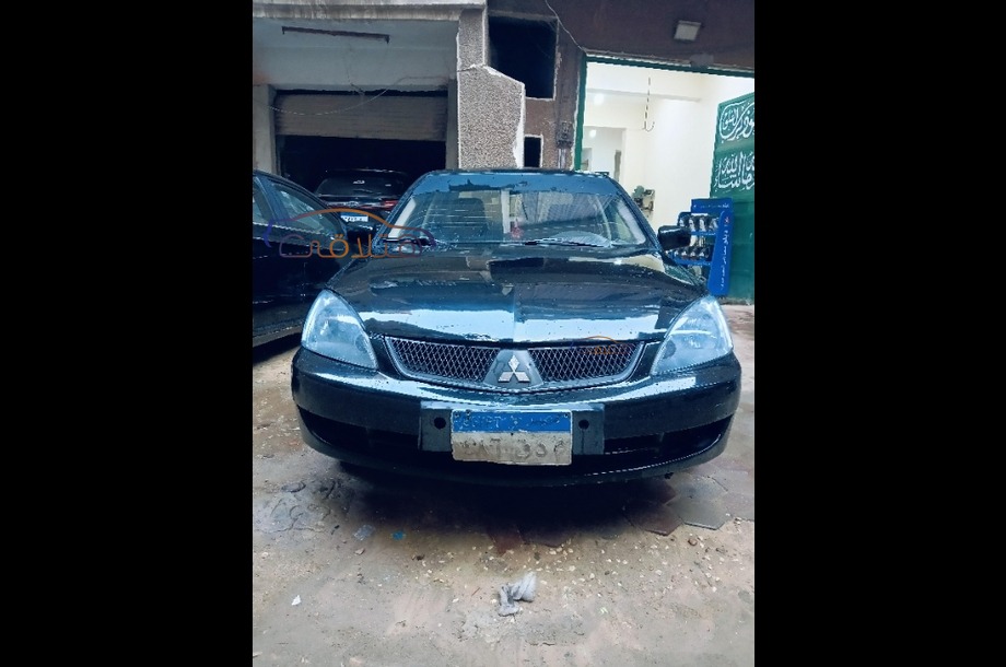 Lancer Puma Mitsubishi أسود