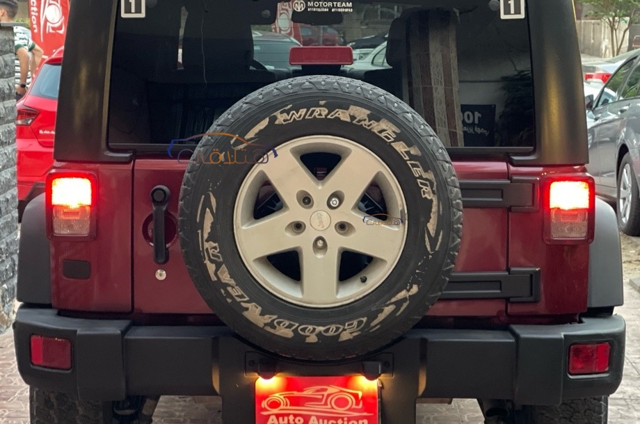 Wrangler Jeep احمر غامق