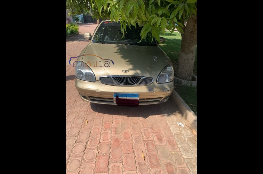 Nubira 2 Daewoo ذهبي