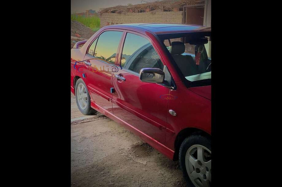 Lancer Puma Mitsubishi احمر