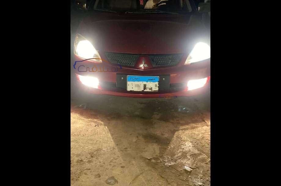 Lancer Puma Mitsubishi احمر