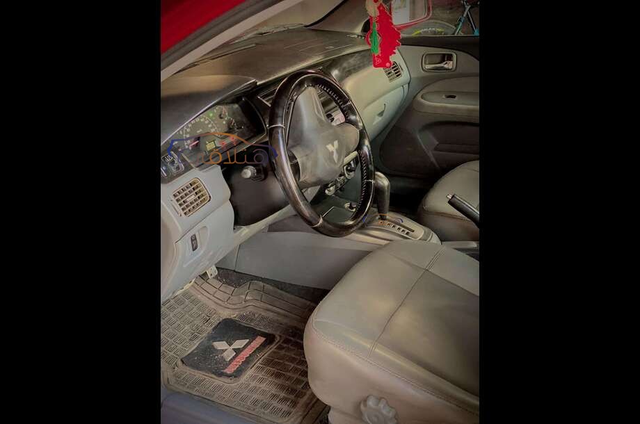 Lancer Puma Mitsubishi احمر