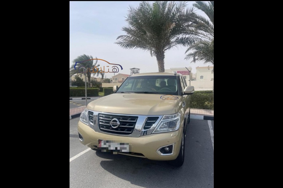 Patrol Nissan ذهبي