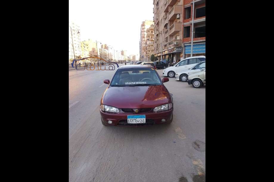 Wira Proton احمر غامق
