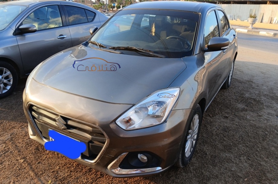 Dzire Suzuki فضي
