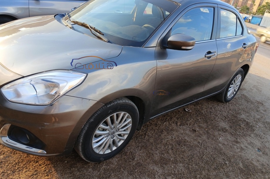 Dzire Suzuki فضي