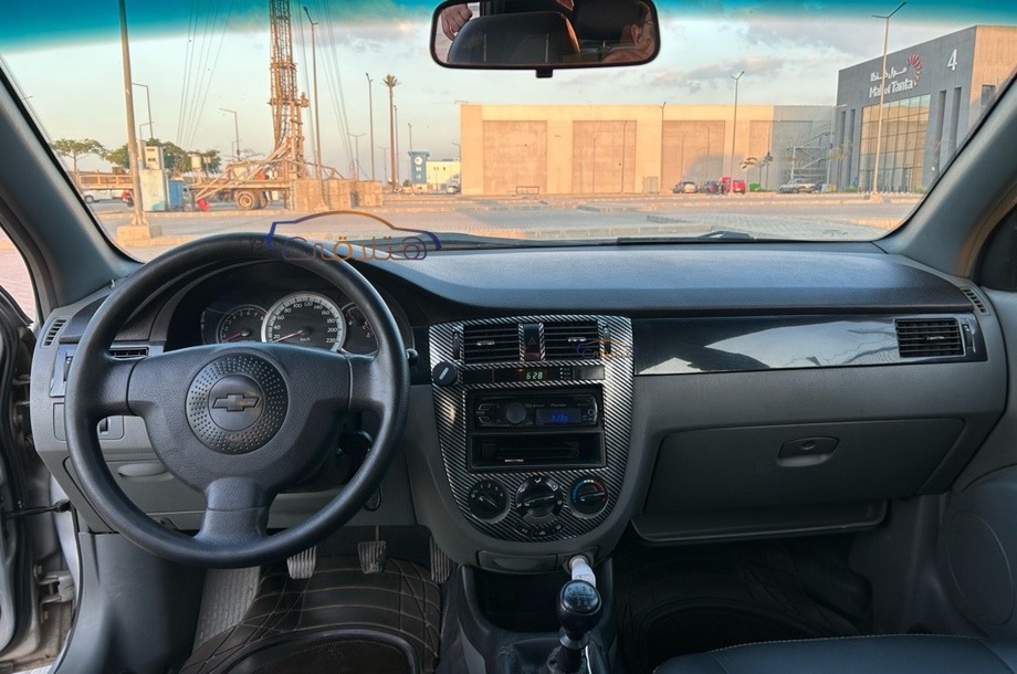 Optra Chevrolet فضي